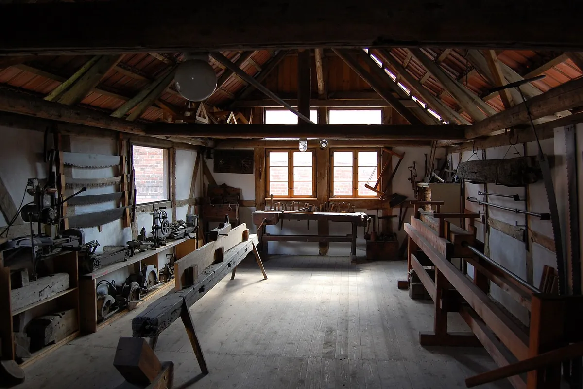 Joiner's workshop with benches and hand tools where cabinets for Lancaster CA homes are made
